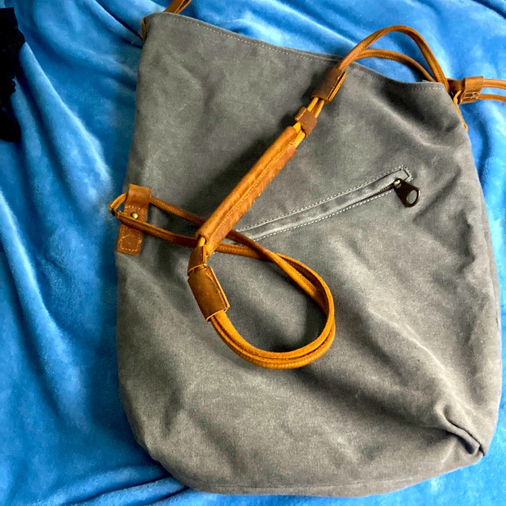 Crossbody bag with nautical theme.